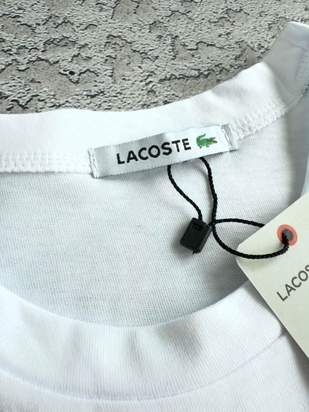 Белая женская футболка Лакоста Lacoste | S м-1695 фото