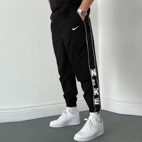 Чорні чоловічі спортивні штани Найк Nike з плащівки | S Sht11 фото